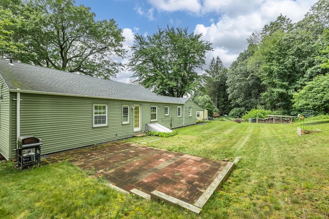 140 Ridgewood Rd, East Hartford, CT 06118 - view of green lawn with a patio