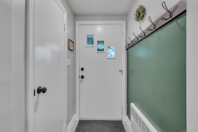 140 Ridgewood Rd, East Hartford, CT 06118 - entryway featuring baseboards and radiator heating unit