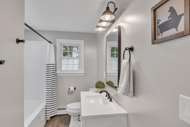 140 Ridgewood Rd, East Hartford, CT 06118 - full bath featuring a baseboard heating unit, wood finished floors, vanity, and shower / tub combo