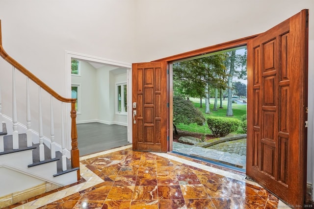 45 Hunting Ridge Rd, Easton, CT 06612 - foyer featuring stairs, marble tiled flooring, and inlaid floor details