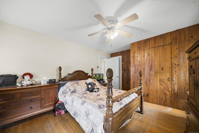 114 Kneeland Rd, New Haven, CT 06512 - bedroom with wood finished floors, wooden walls, and a ceiling fan