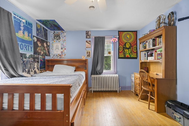 114 Kneeland Rd, New Haven, CT 06512 - bedroom featuring radiator, wood-type flooring, and a ceiling fan