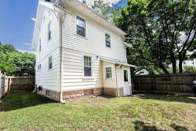38 Francis Ave, Hamden, CT 06517 - rear view of house with a fenced backyard