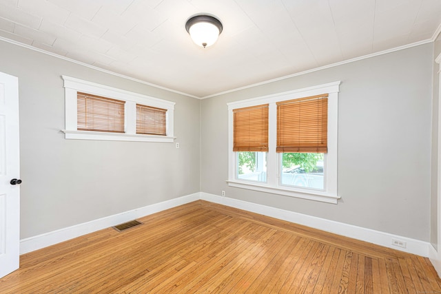 38 Francis Ave, Hamden, CT 06517 - empty room with crown molding and light wood-style flooring