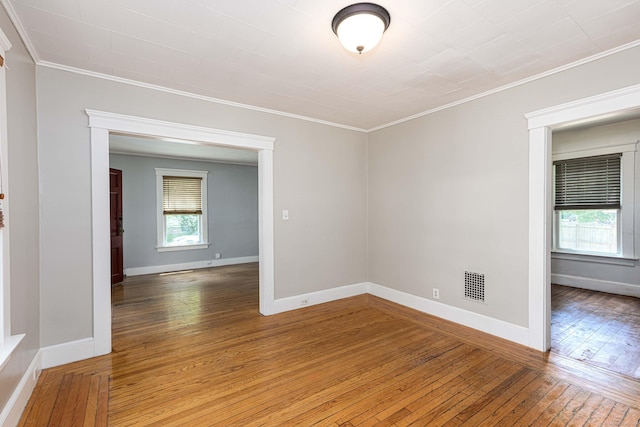 38 Francis Ave, Hamden, CT 06517 - empty room featuring crown molding and wood-type flooring