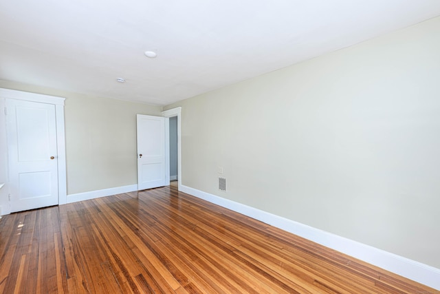 38 Francis Ave, Hamden, CT 06517 - empty room featuring baseboards and hardwood / wood-style flooring