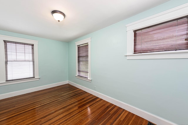 38 Francis Ave, Hamden, CT 06517 - empty room with baseboards and dark wood finished floors
