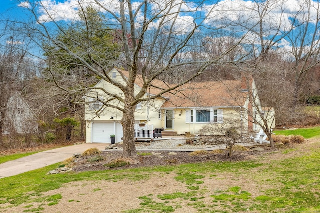 438 Woodland St, Glastonbury, CT 06073 - view of front of home featuring a garage and driveway