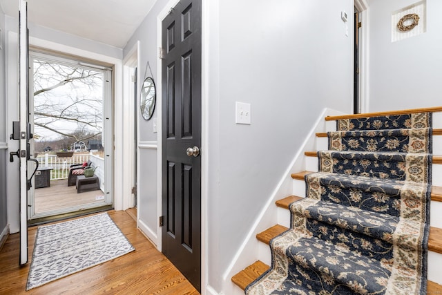 438 Woodland St, Glastonbury, CT 06073 - foyer entrance with stairs and wood finished floors