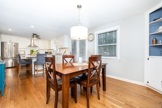 438 Woodland St, Glastonbury, CT 06073 - dining area with light wood-style flooring and recessed lighting