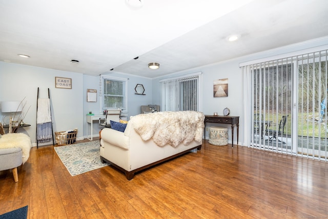 438 Woodland St, Glastonbury, CT 06073 - living area with wood-type flooring, an office area, recessed lighting, and ornamental molding