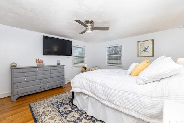438 Woodland St, Glastonbury, CT 06073 - bedroom with wood finished floors and a ceiling fan
