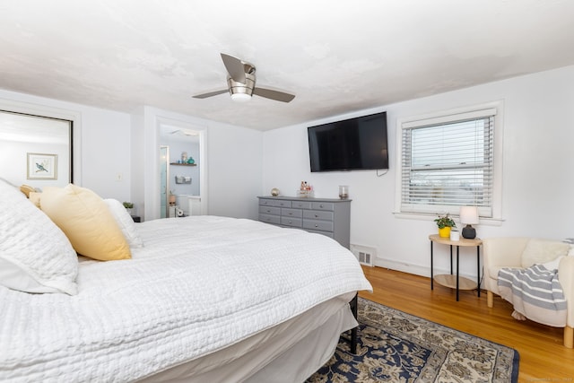 438 Woodland St, Glastonbury, CT 06073 - bedroom with wood finished floors and ceiling fan