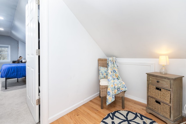 438 Woodland St, Glastonbury, CT 06073 - sitting room with vaulted ceiling and light wood finished floors