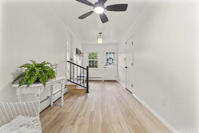 103 Perry Rd, Bristol, CT 06010 - entryway featuring light wood-type flooring, stairway, ceiling fan, and baseboard heating