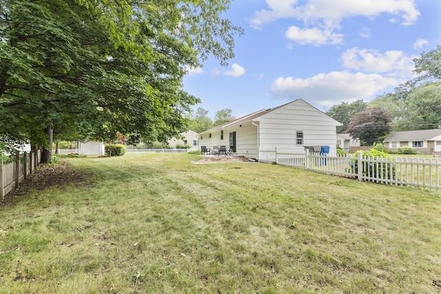 103 Perry Rd, Bristol, CT 06010 - fenced backyard with a storage shed and a patio area