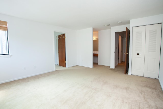 14 Old Mill Ct Unit 14, Simsbury, CT 06070 - unfurnished bedroom featuring light carpet and a closet