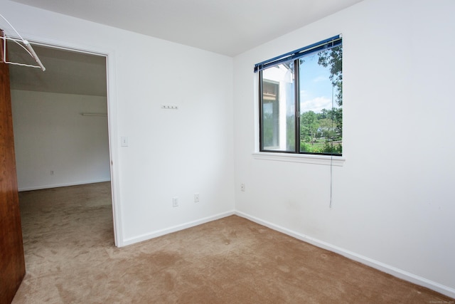 14 Old Mill Ct Unit 14, Simsbury, CT 06070 - carpeted empty room featuring baseboards