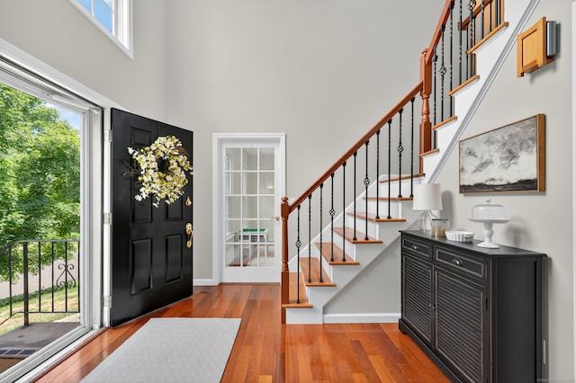 26 Rockwood Dr, Portland, CT 06480 - entrance foyer with a high ceiling, hardwood / wood-style floors, and stairway