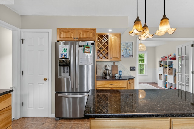 26 Rockwood Dr, Portland, CT 06480 - kitchen featuring stainless steel fridge, tasteful backsplash, tile patterned floors, hanging light fixtures, and dark stone countertops