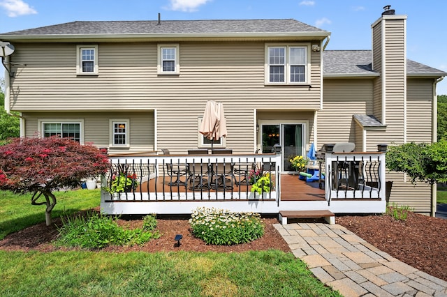26 Rockwood Dr, Portland, CT 06480 - rear view of property featuring a wooden deck, a chimney, outdoor dining area, and roof with shingles