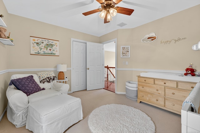 26 Rockwood Dr, Portland, CT 06480 - living area featuring light carpet, ceiling fan, and an upstairs landing