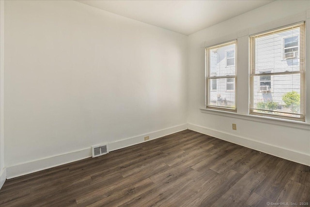 118 New Haven Ave, Derby, CT 06418 - spare room featuring baseboards and dark wood-type flooring