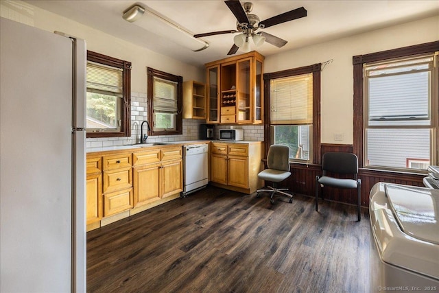 118 New Haven Ave, Derby, CT 06418 - kitchen with freestanding refrigerator, white dishwasher, light countertops, a wainscoted wall, and dark wood finished floors