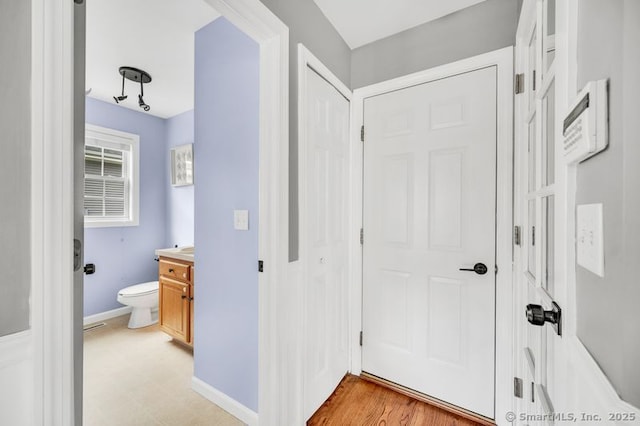 51 Olde Village Cir Unit 51, Wallingford, CT 06492 - hall featuring baseboards and light flooring
