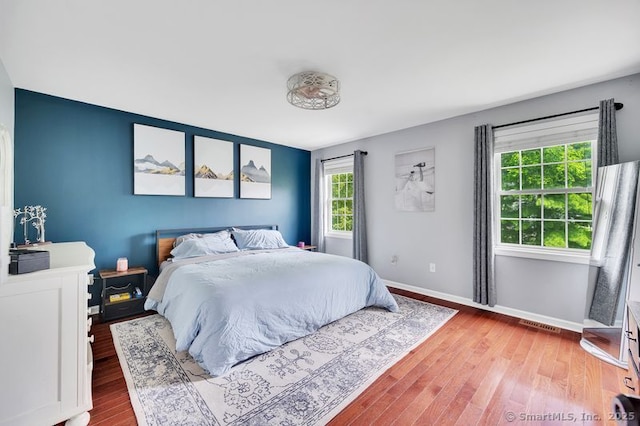51 Olde Village Cir Unit 51, Wallingford, CT 06492 - bedroom featuring wood finished floors and baseboards