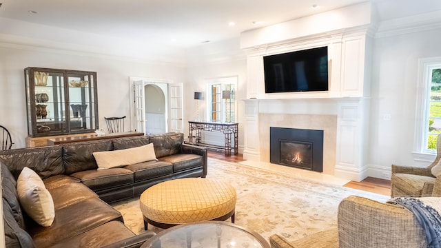 7 Taunton Ln, Newtown, CT 06470 - living area featuring a high end fireplace, wood finished floors, and ornamental molding