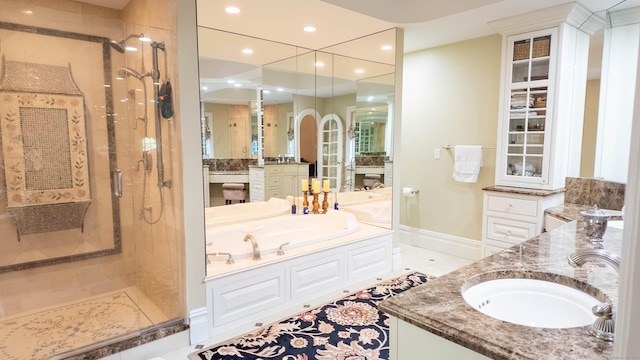 7 Taunton Ln, Newtown, CT 06470 - full bath with vanity, a stall shower, a garden tub, and recessed lighting