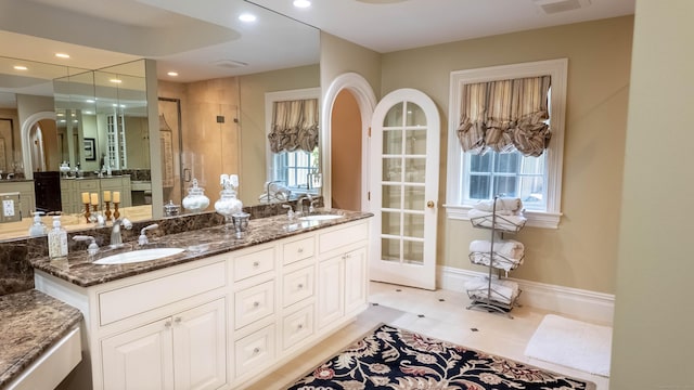 7 Taunton Ln, Newtown, CT 06470 - full bath with double vanity, a stall shower, recessed lighting, and tile patterned flooring