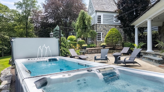 7 Taunton Ln, Newtown, CT 06470 - view of swimming pool featuring a hot tub and a patio