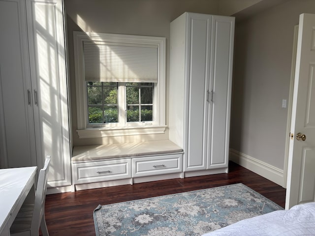 7 Taunton Ln, Newtown, CT 06470 - unfurnished bedroom with dark wood-style floors and baseboards