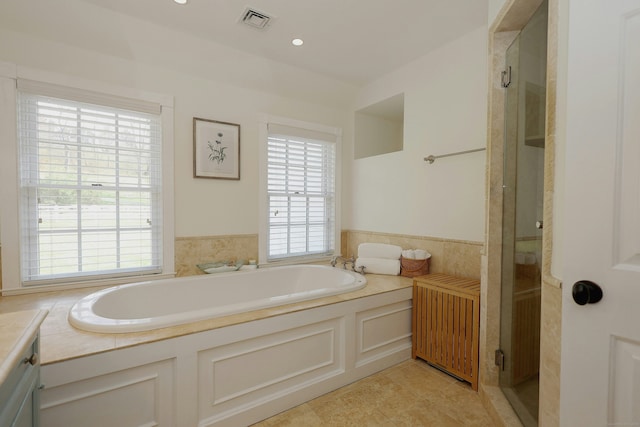 37 Giles Hill Rd, Redding, CT 06896 - bathroom featuring radiator heating unit, a bath, a stall shower, and vanity