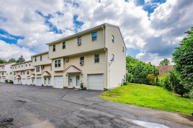 66 Atwood St Apt 16, Plainville, CT 06062 - view of front facade with a front lawn and a residential view
