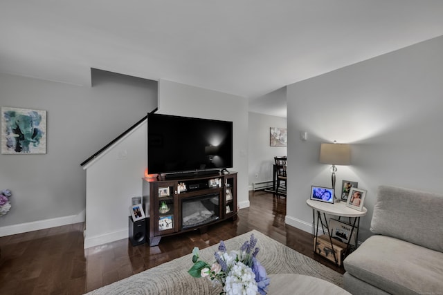 66 Atwood St Apt 16, Plainville, CT 06062 - living room with a baseboard heating unit and wood finished floors