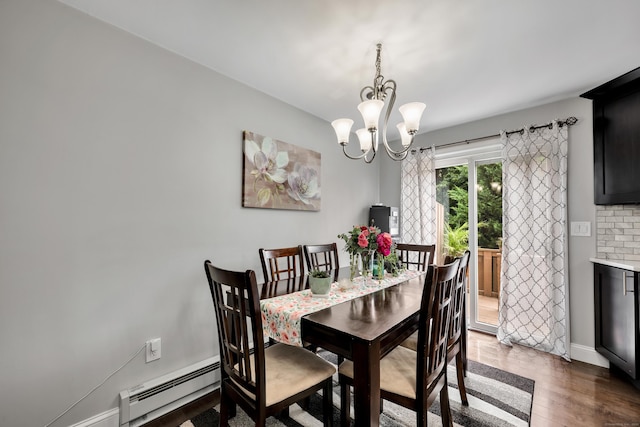 66 Atwood St Apt 16, Plainville, CT 06062 - dining room featuring baseboard heating, dark wood finished floors, and a chandelier