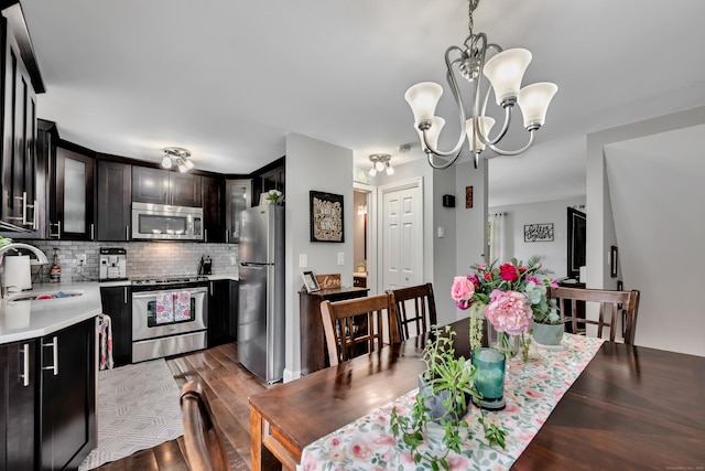 66 Atwood St Apt 16, Plainville, CT 06062 - dining space with light wood-style floors and a chandelier