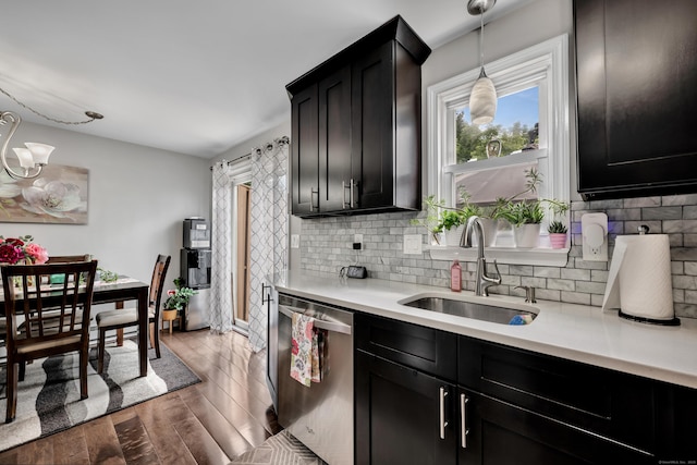 66 Atwood St Apt 16, Plainville, CT 06062 - kitchen with dishwasher, light countertops, tasteful backsplash, and light wood-style floors
