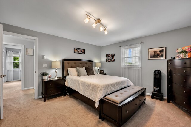 66 Atwood St Apt 16, Plainville, CT 06062 - bedroom with light carpet and baseboards