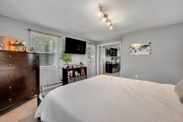 66 Atwood St Apt 16, Plainville, CT 06062 - bedroom featuring a baseboard radiator and a closet