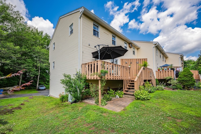 66 Atwood St Apt 16, Plainville, CT 06062 - back of house with a wooden deck, a yard, and stairway