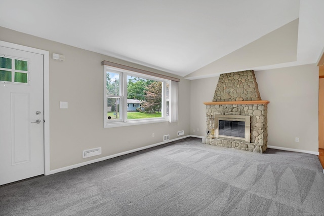 170 Scantic Meadow Rd, South Windsor, CT 06074 - unfurnished living room featuring carpet, vaulted ceiling, and a stone fireplace