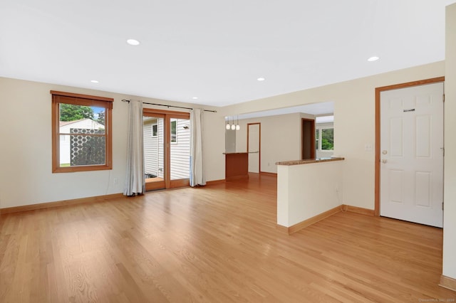 170 Scantic Meadow Rd, South Windsor, CT 06074 - unfurnished living room featuring light wood-style floors and recessed lighting