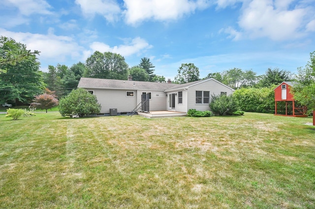 170 Scantic Meadow Rd, South Windsor, CT 06074 - back of property with a wooden deck, a chimney, and a yard