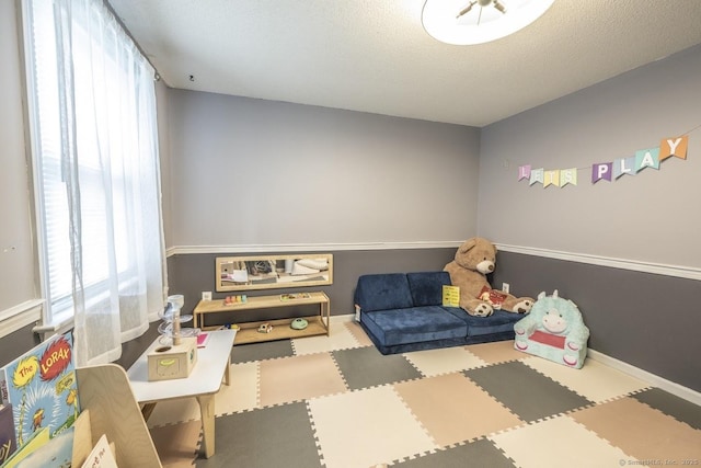1018 Long Hill Rd, Middletown, CT 06457 - game room with baseboards and a textured ceiling