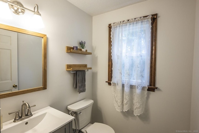 1018 Long Hill Rd, Middletown, CT 06457 - bathroom featuring vanity and a textured ceiling