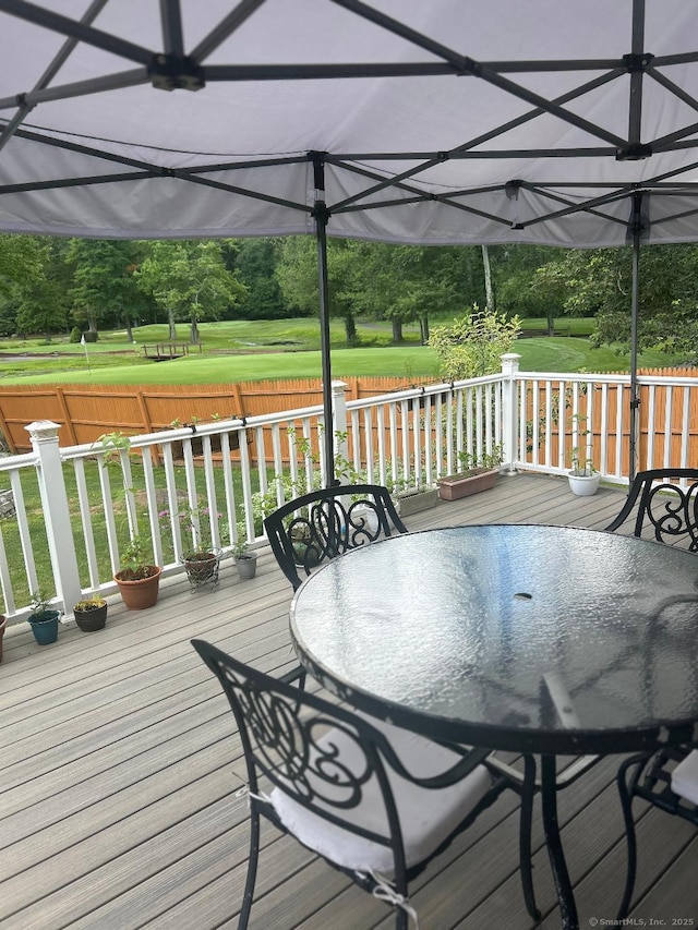 330 Dogburn Ln, Orange, CT 06477 - wooden deck with outdoor dining space